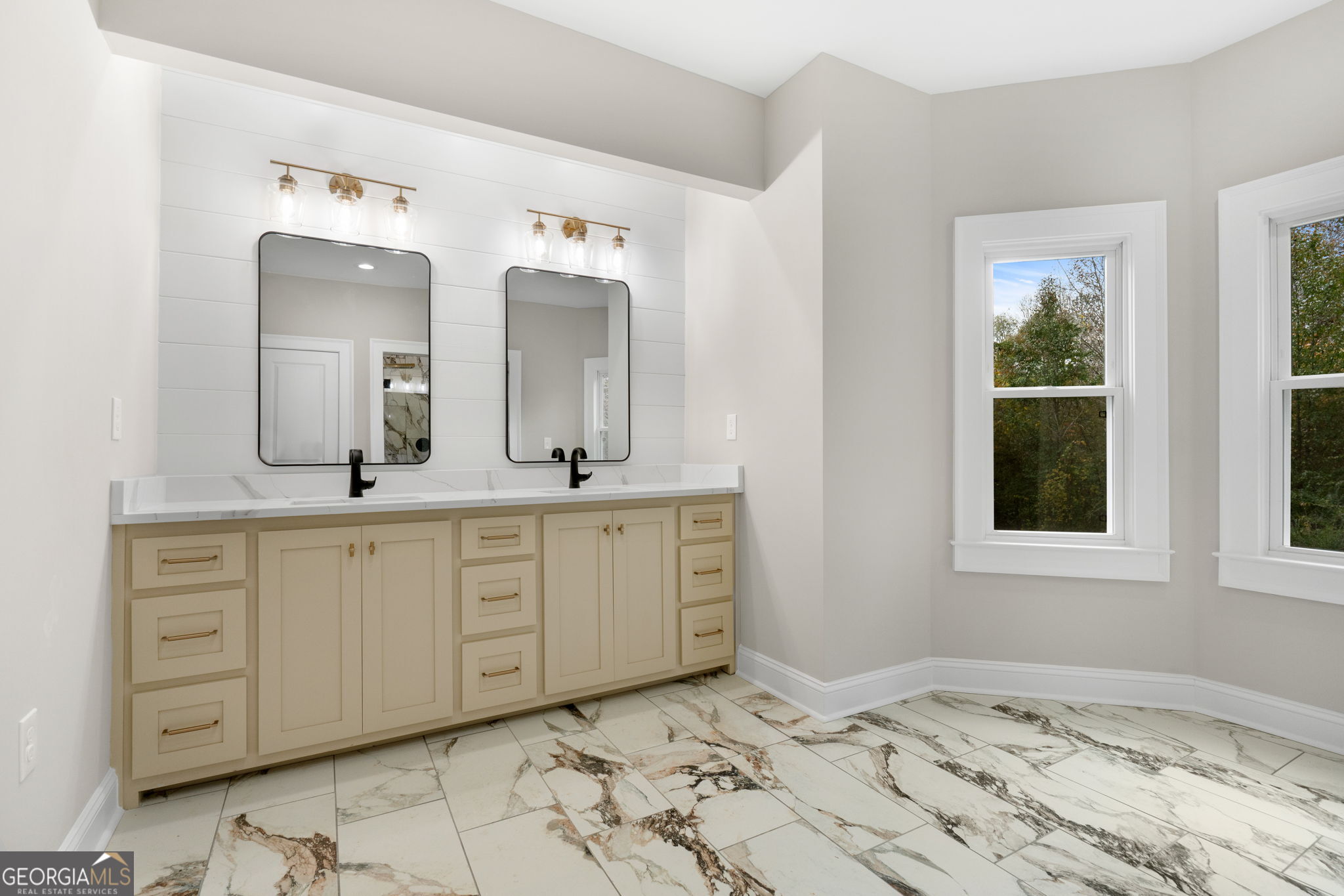 164 I I Walker Brooks Road Newnan, GA 30263 - Photo 30 of 54 a spacious bathroom with a double vanity sink and a mirror