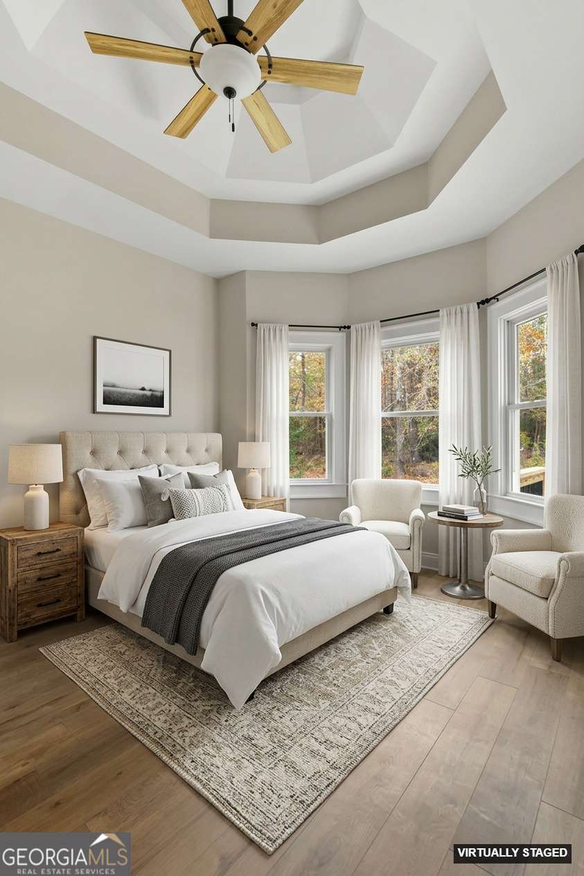 164 I I Walker Brooks Road Newnan, GA 30263 - Photo 35 of 54 a bedroom with a large bed and a couch