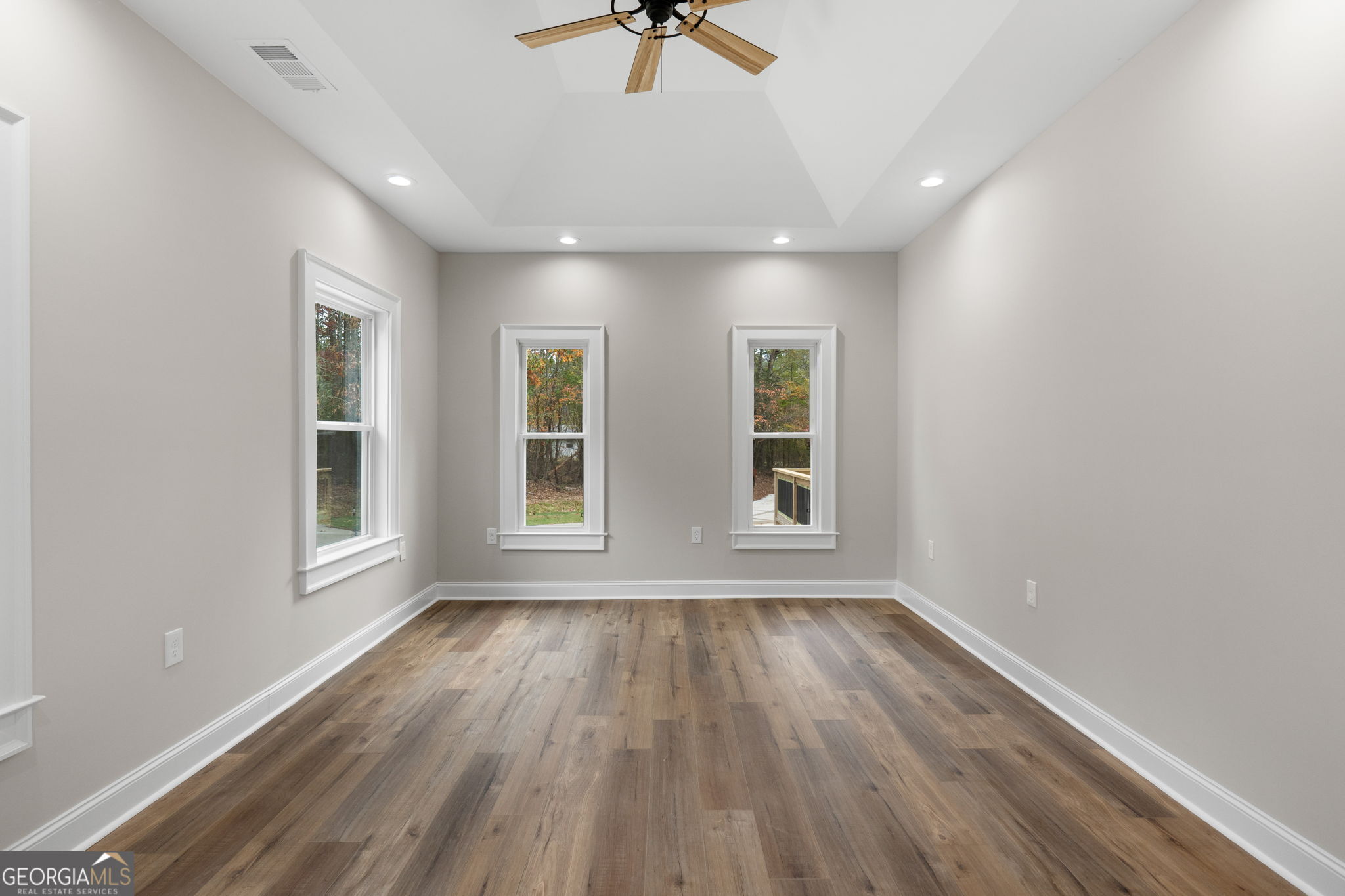 164 I I Walker Brooks Road Newnan, GA 30263 - Photo 39 of 54 wooden floor in an empty room with a window