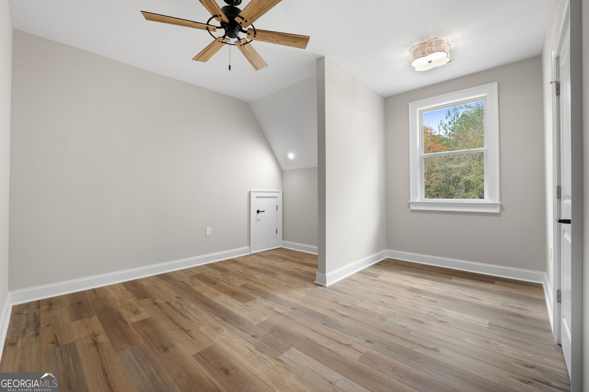 164 I I Walker Brooks Road Newnan, GA 30263 - Photo 45 of 54 an empty room with fan and windows