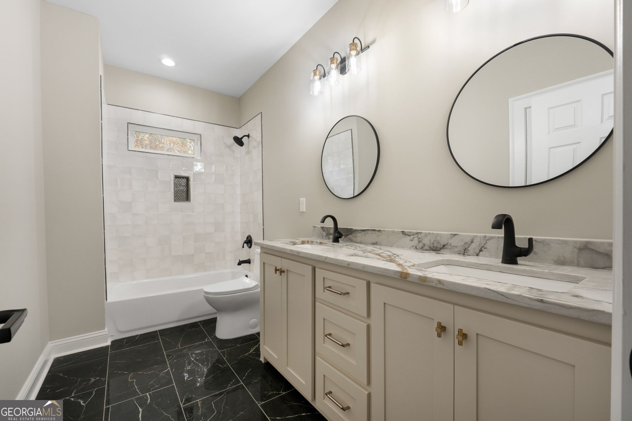164 I I Walker Brooks Road Newnan, GA 30263 - Photo 47 of 54 a bathroom with a granite countertop sink a toilet and a mirror
