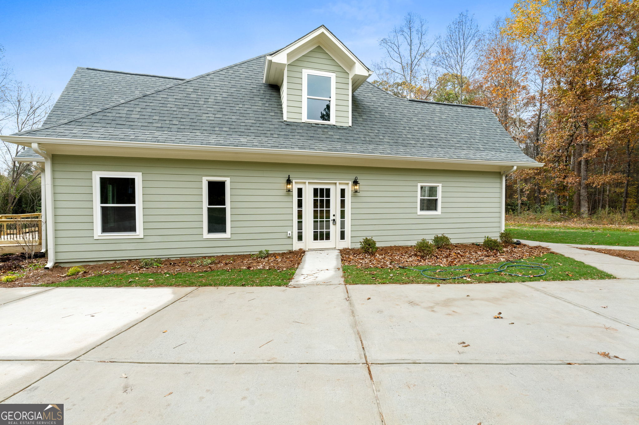 164 I I Walker Brooks Road Newnan, GA 30263 - Photo 8 of 54 a front view of a house with a yard