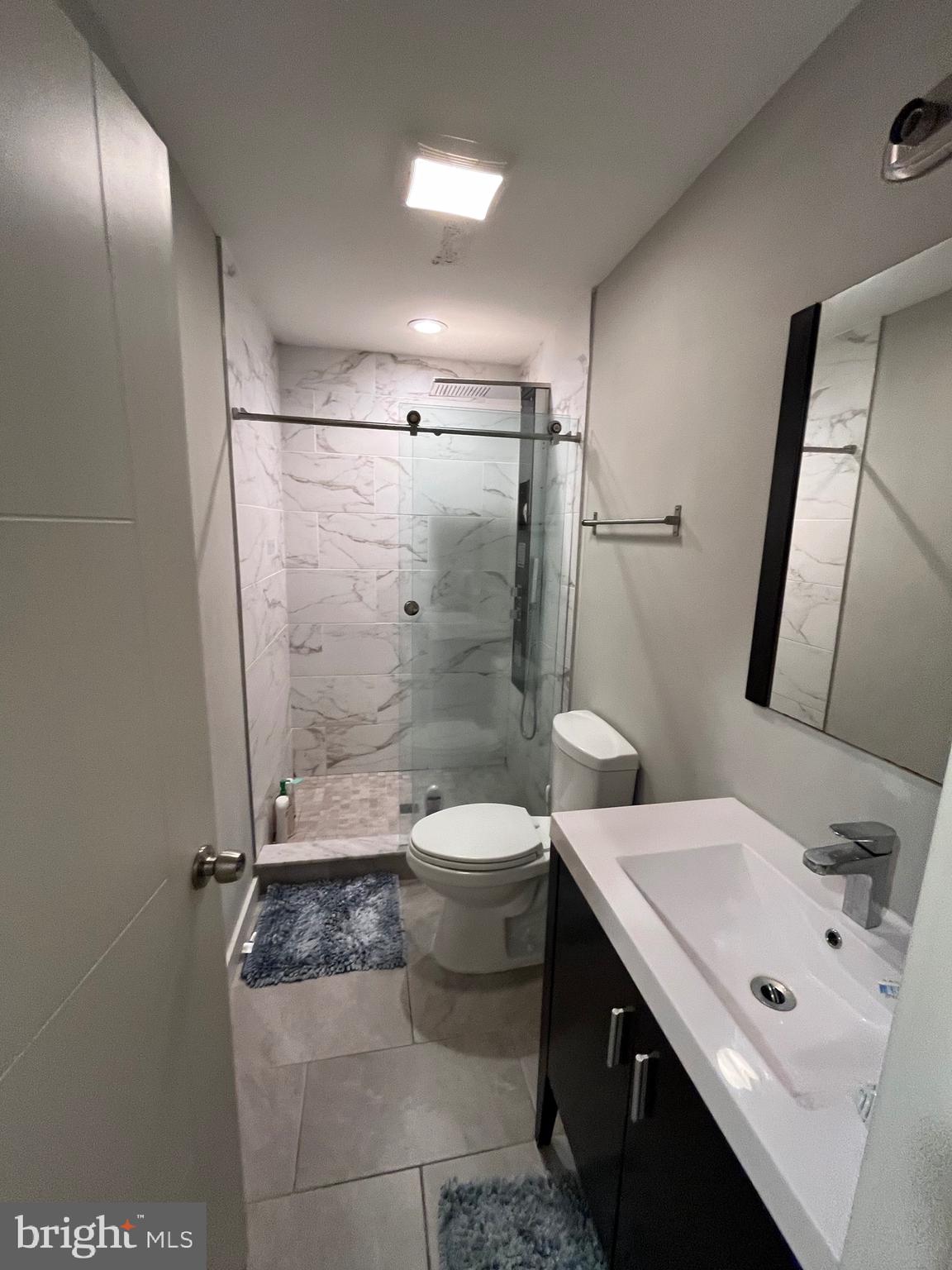 1625 Fontain Street Philadelphia, PA 19121 - Photo 20 of 24 a bathroom with a sink toilet and shower