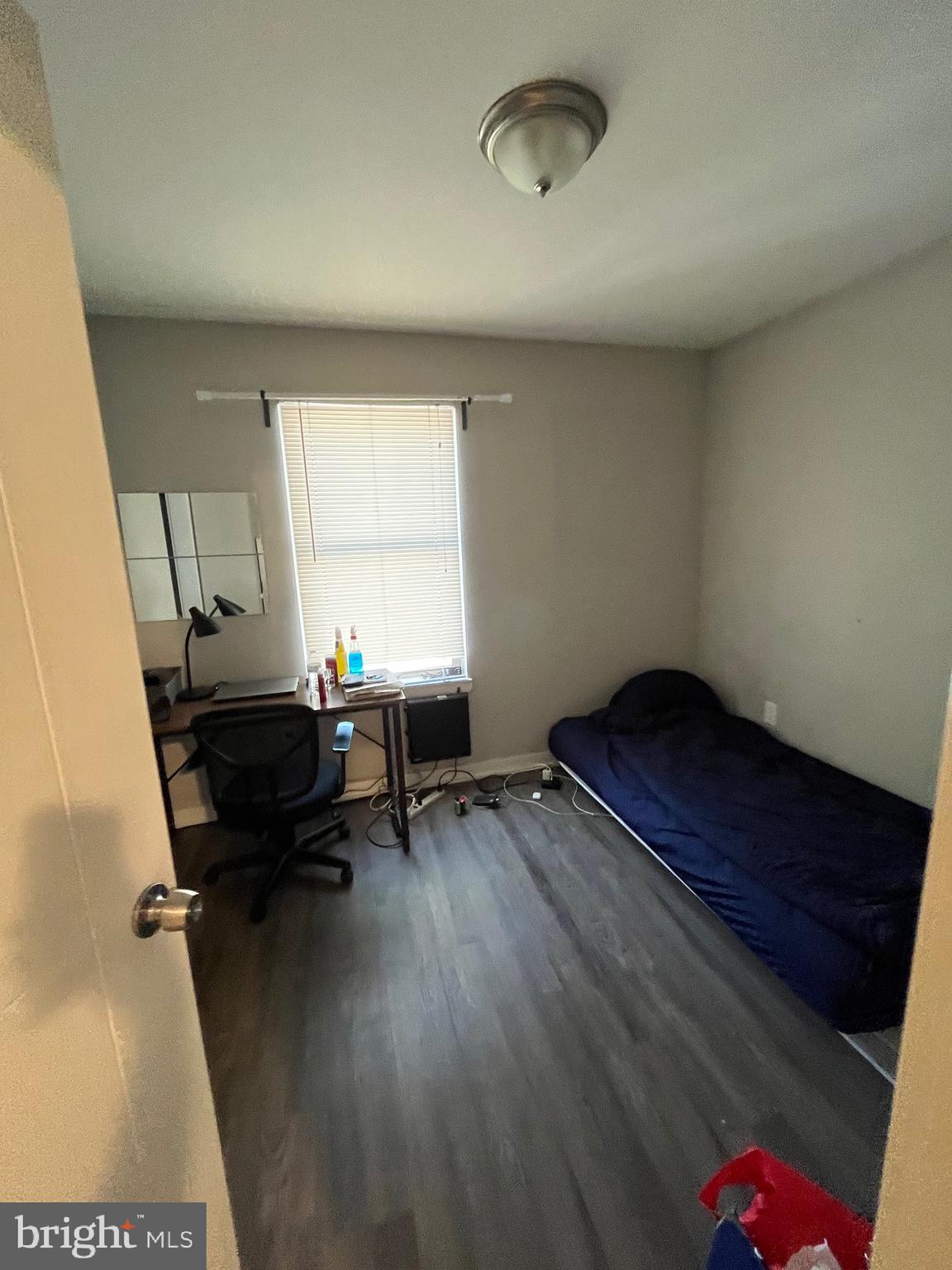 1625 Fontain Street Philadelphia, PA 19121 - Photo 24 of 24 a living room with furniture and a window