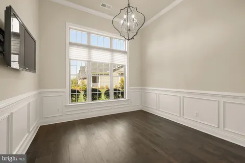 a livingroom with a flat screen tv