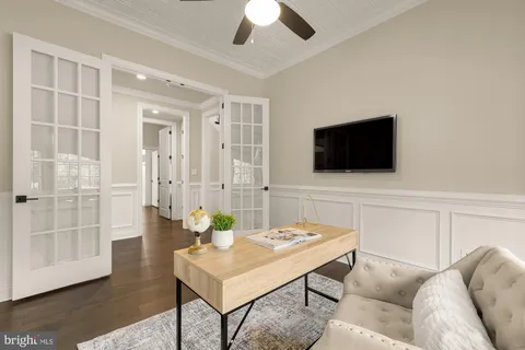 a view of a storage and utility room with washer and dryer