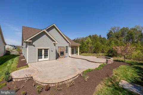 an aerial view of a house with a garden