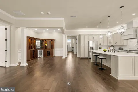 a view of kitchen with cabinets and stainless steel appliances