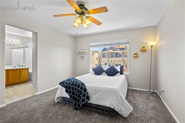 7523 Coffee Road Peyton, CO 80831 - Photo 11 of 18 Primary bedroom with all new flooring and paint!