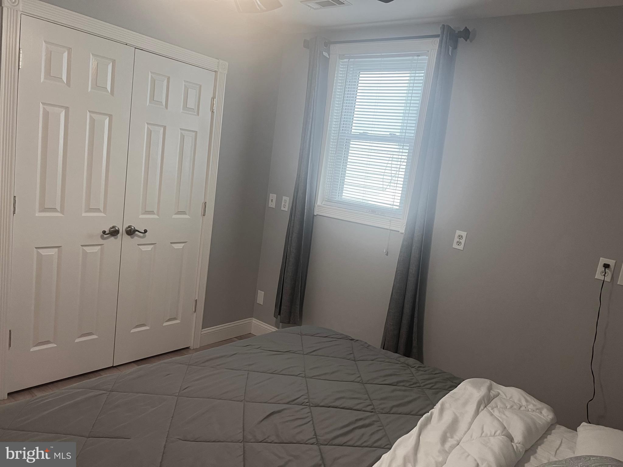 33 South Main Street Boonsboro, MD 21713 - Photo 11 of 34 a bedroom with a bed and a window
