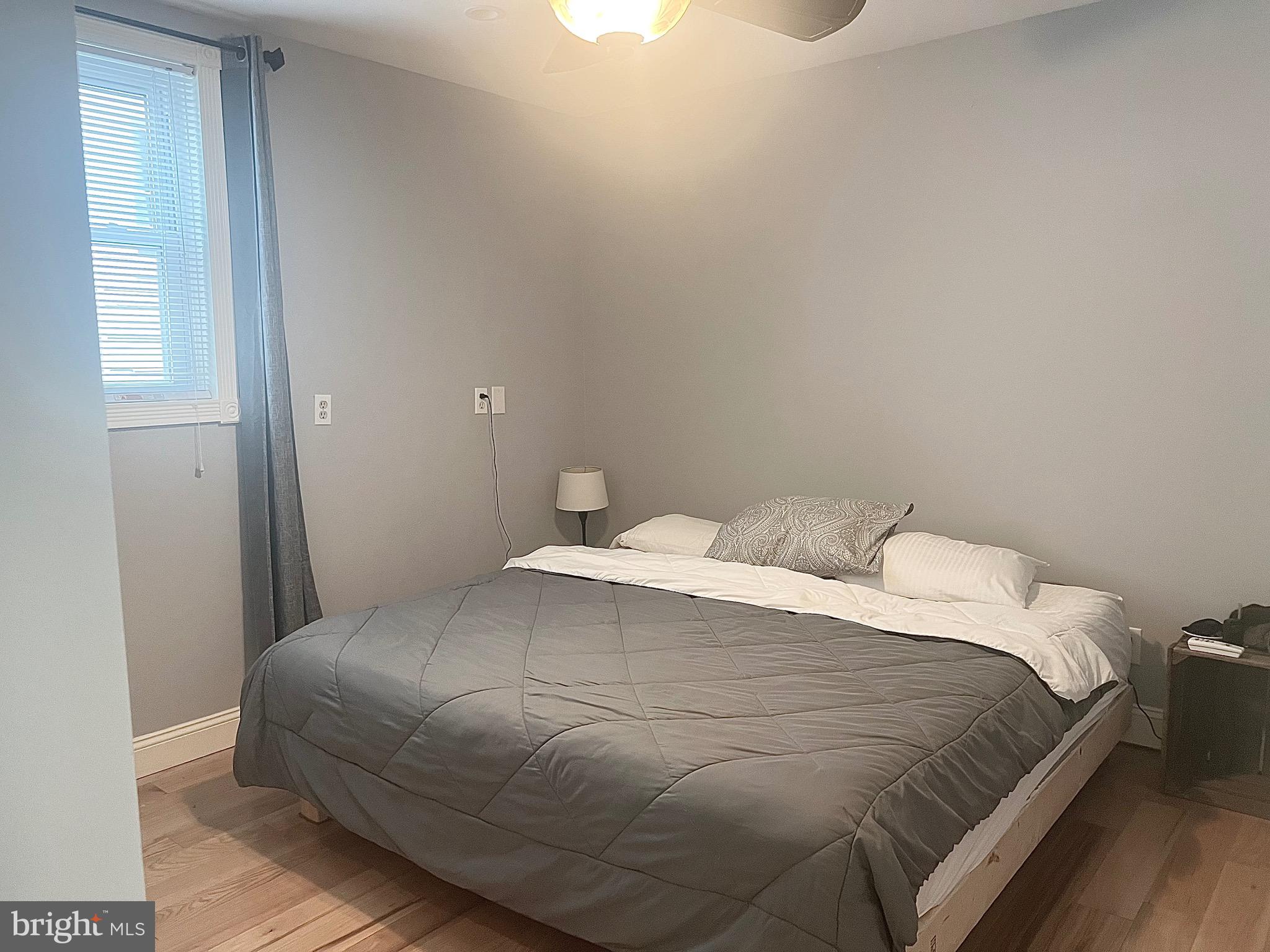 33 South Main Street Boonsboro, MD 21713 - Photo 12 of 34 a bedroom with a bed and a window