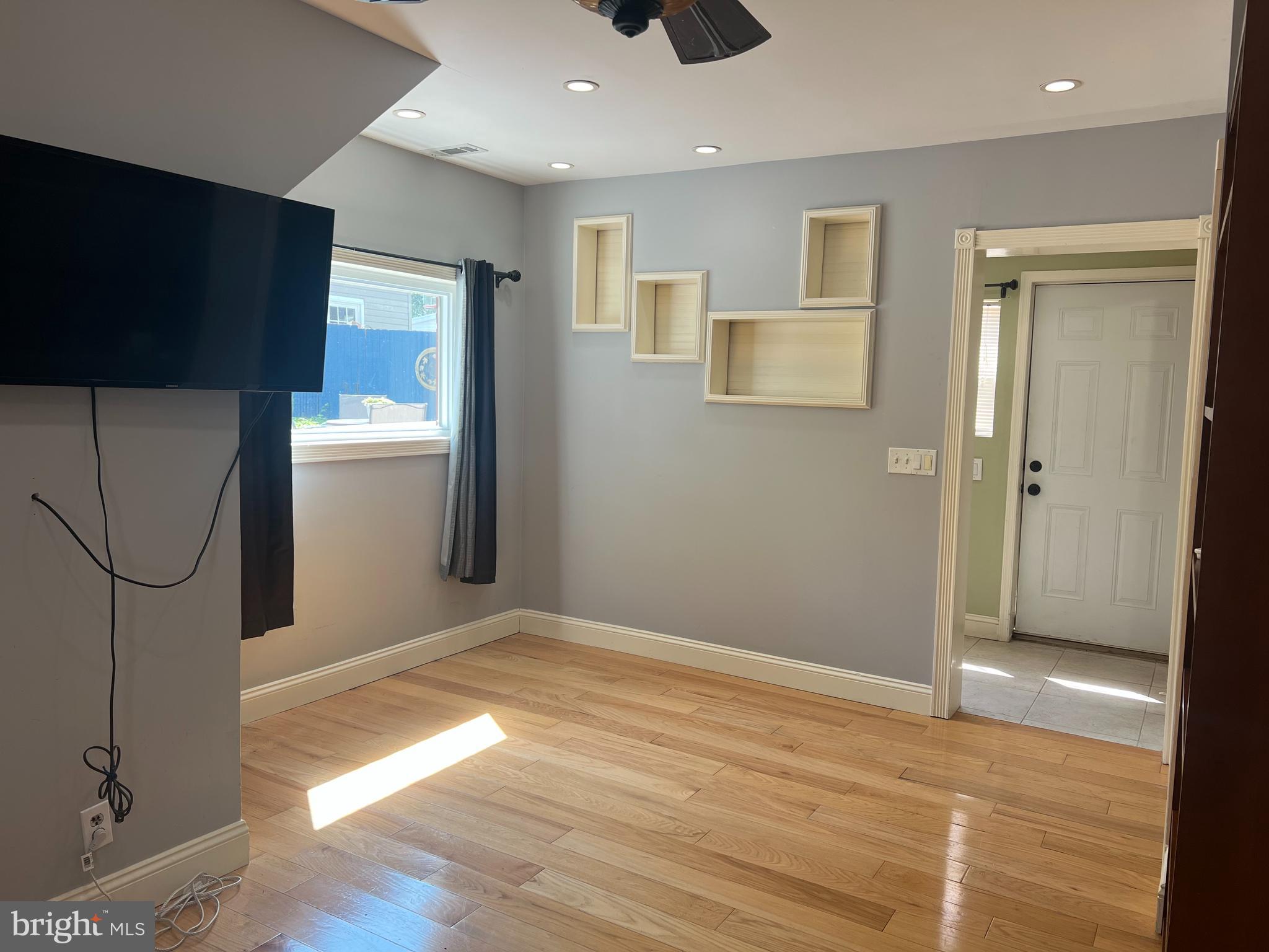 33 South Main Street Boonsboro, MD 21713 - Photo 19 of 34 a view of an empty room with wooden floor and a cabinet