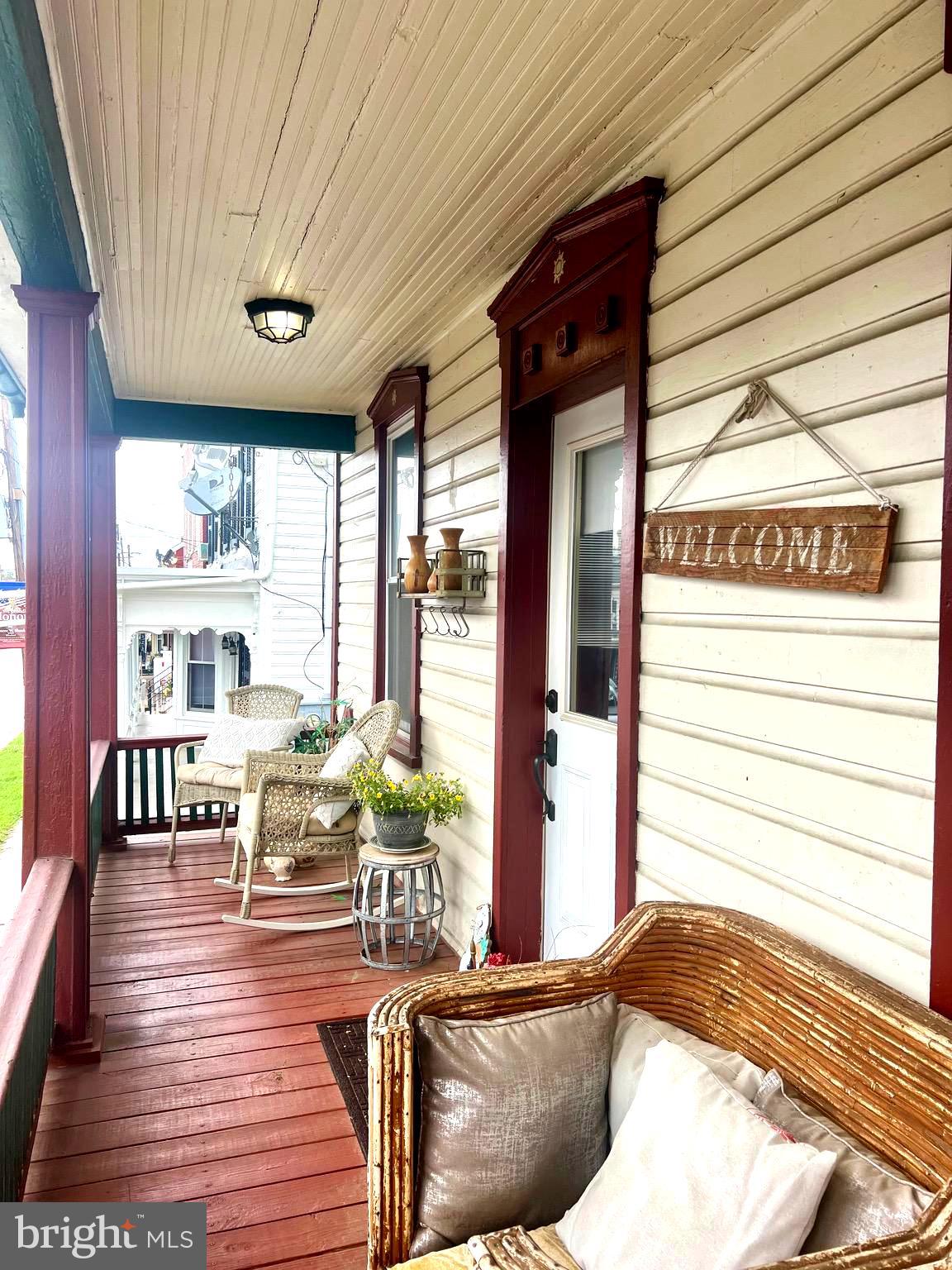 33 South Main Street Boonsboro, MD 21713 - Photo 2 of 34 a living room with furniture wooden floor and a large window
