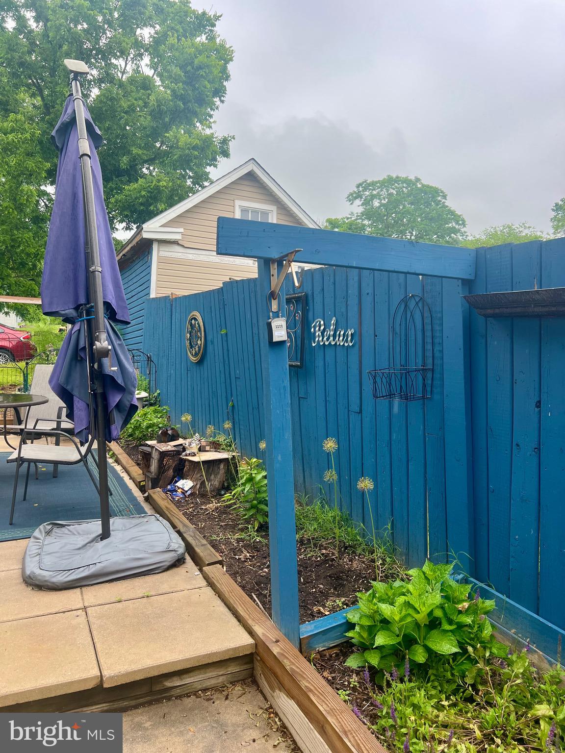 33 South Main Street Boonsboro, MD 21713 - Photo 27 of 34 a view of a house with backyard water fountain and sitting area