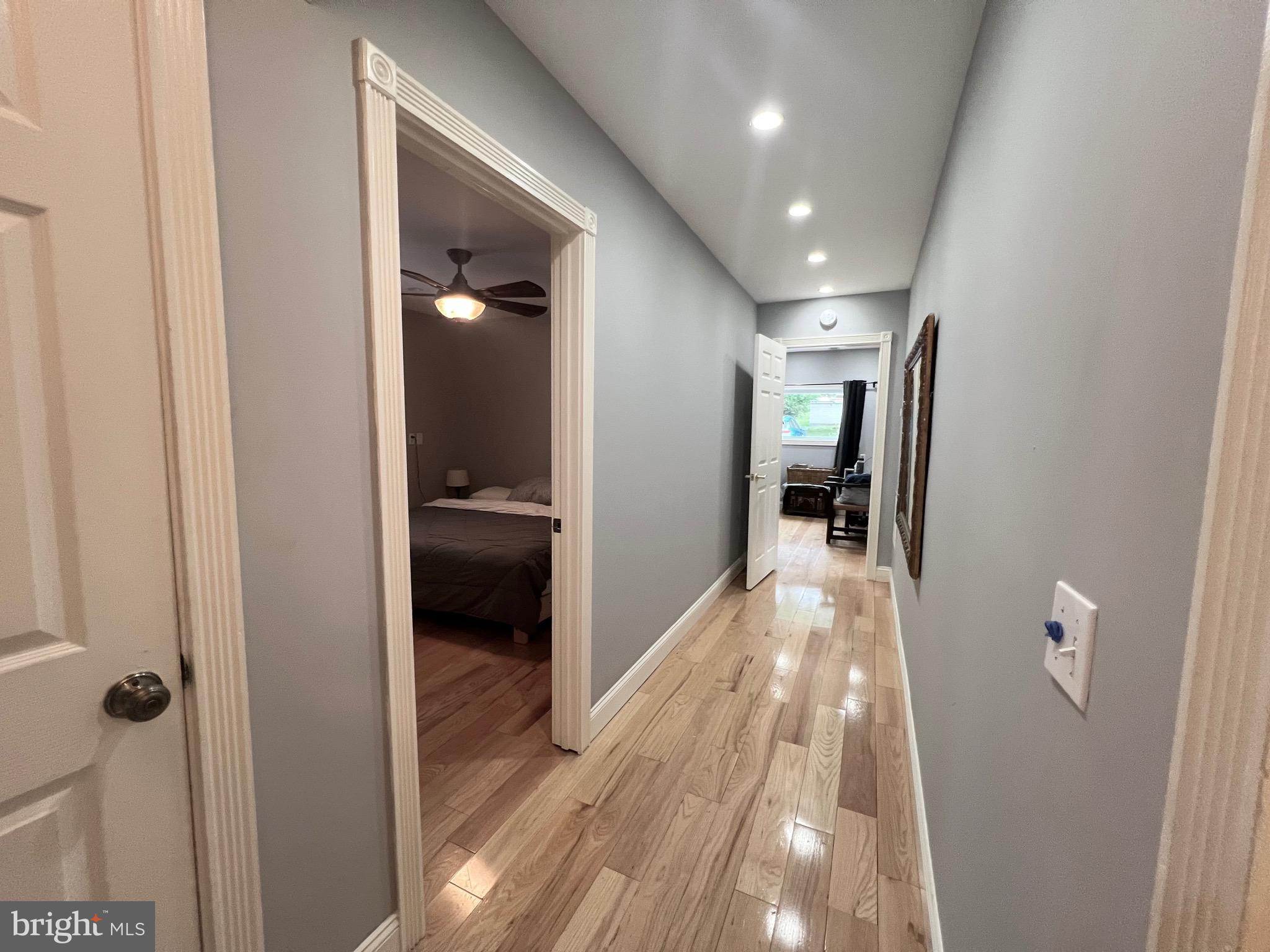 33 South Main Street Boonsboro, MD 21713 - Photo 9 of 34 a view of a hallway with wooden floor and staircase