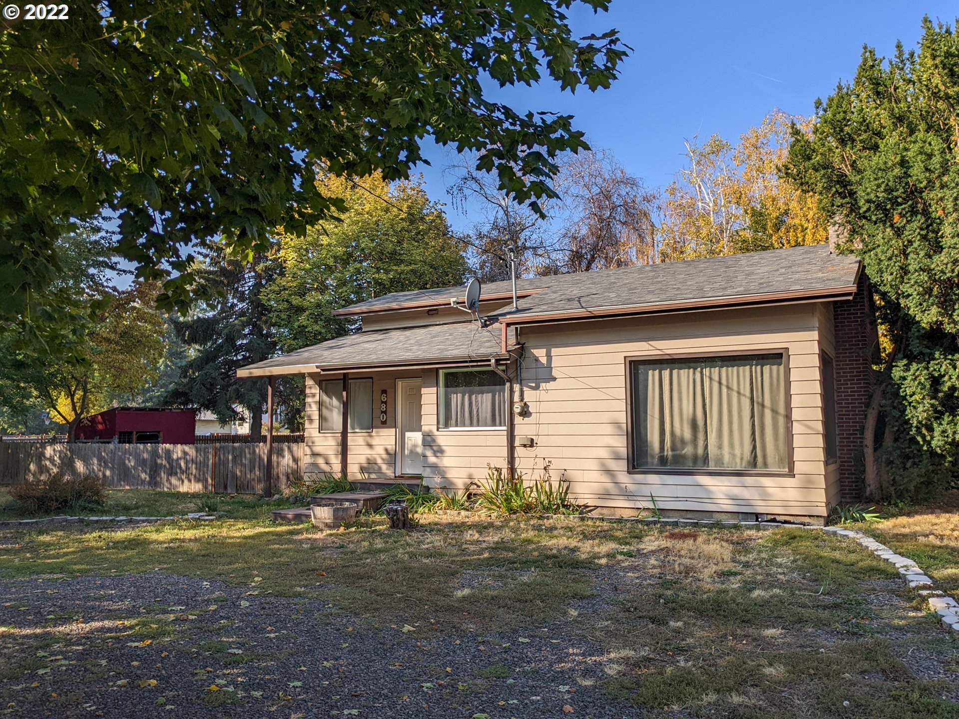 680 Ruckman Avenue Imbler, OR 97841 - Photo 1 of 24 a front view of a house with a garden
