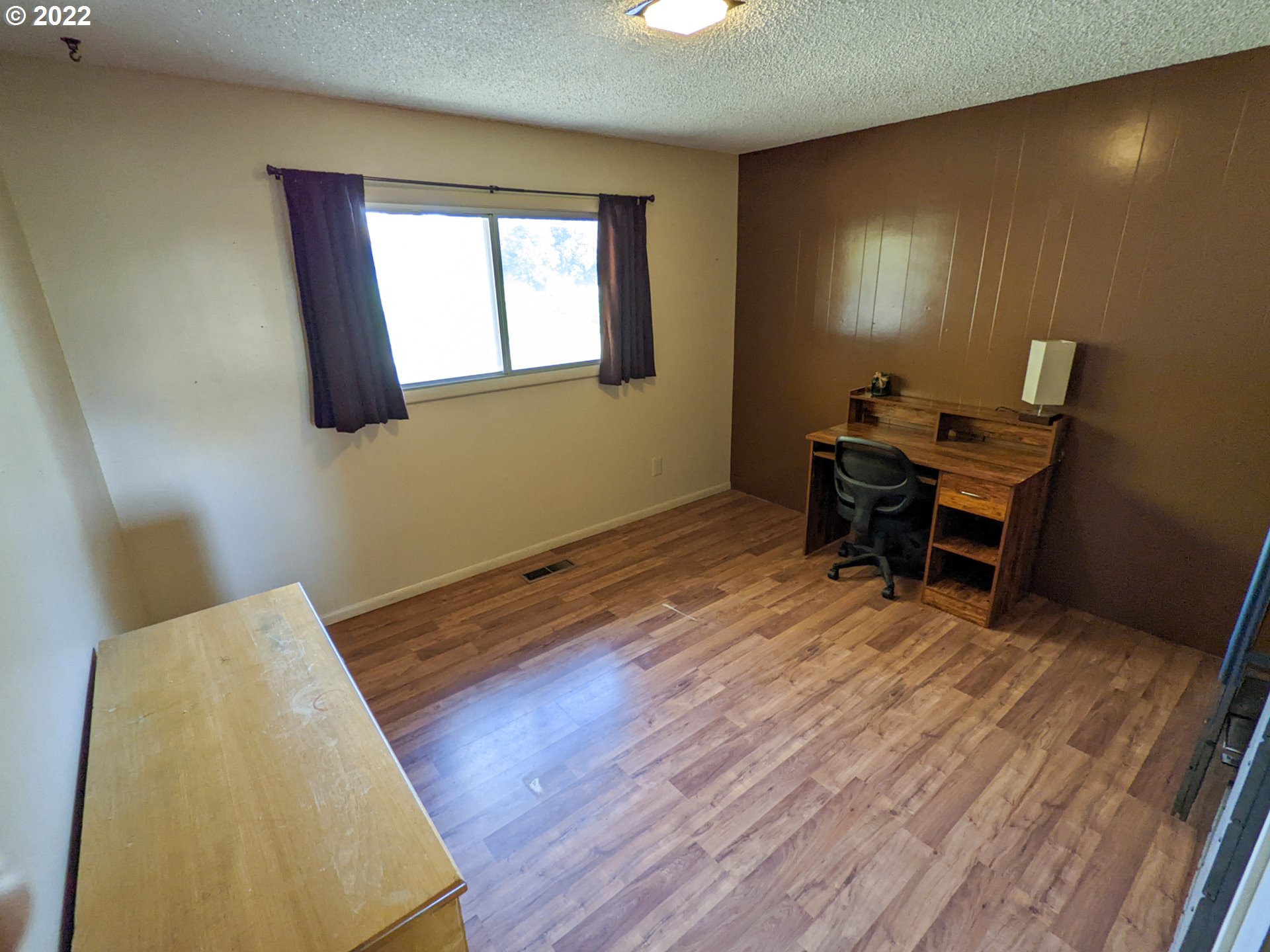 680 Ruckman Avenue Imbler, OR 97841 - Photo 12 of 24 a workspace with wooden floor and a window