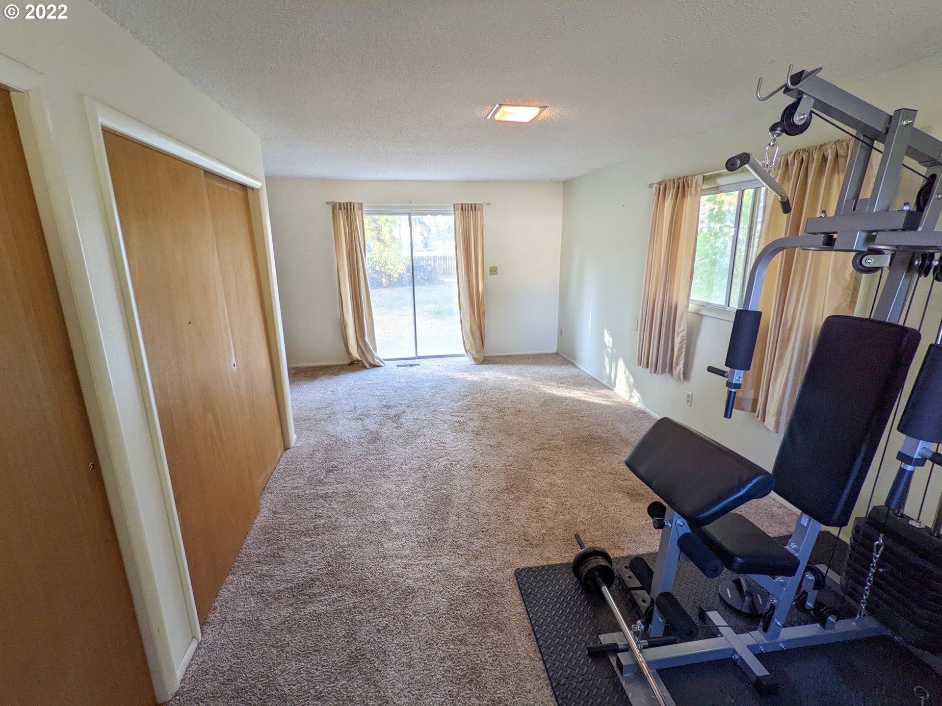 680 Ruckman Avenue Imbler, OR 97841 - Photo 16 of 24 a view of a room with furniture and wooden floor