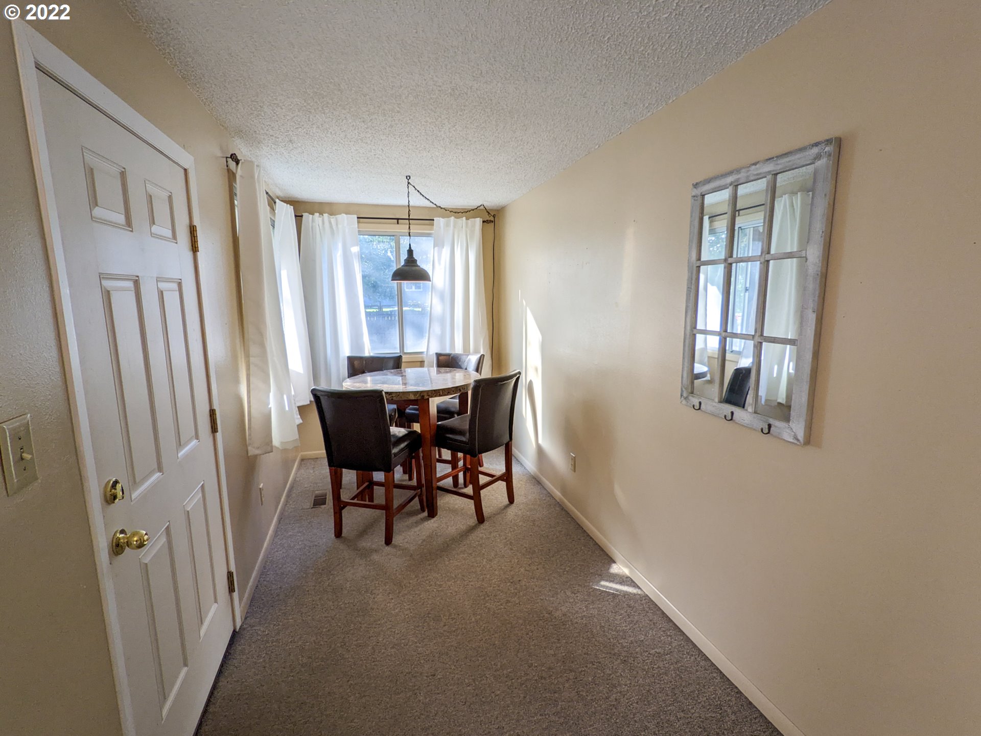 680 Ruckman Avenue Imbler, OR 97841 - Photo 5 of 24 a view of a livingroom with furniture and window