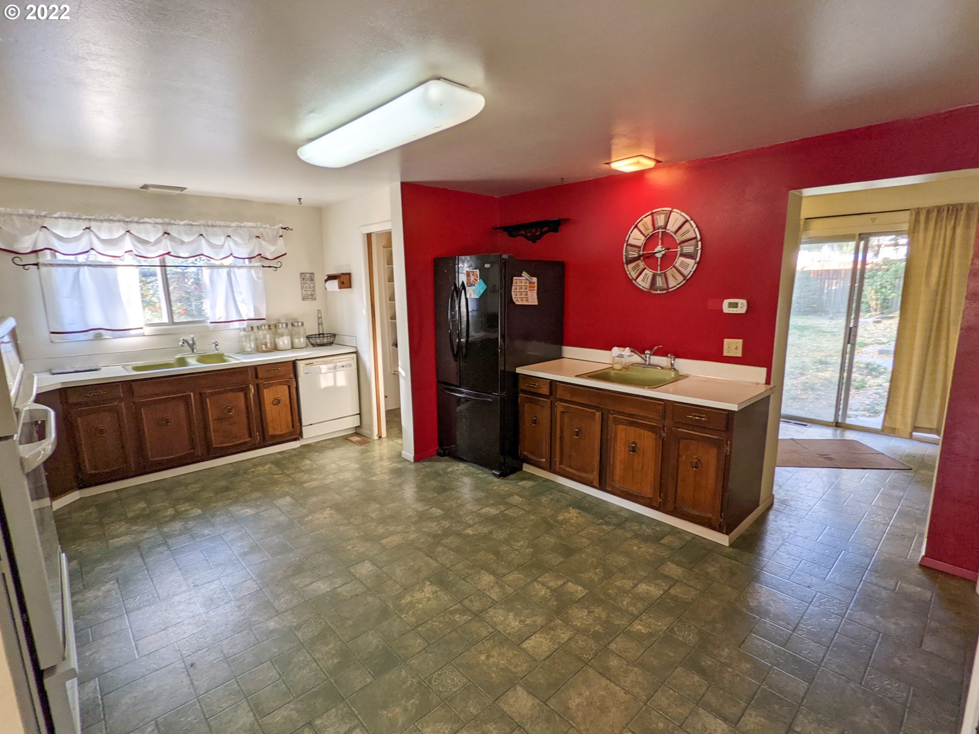 680 Ruckman Avenue Imbler, OR 97841 - Photo 7 of 24 a large kitchen with stainless steel appliances granite countertop a stove oven and a refrigerator