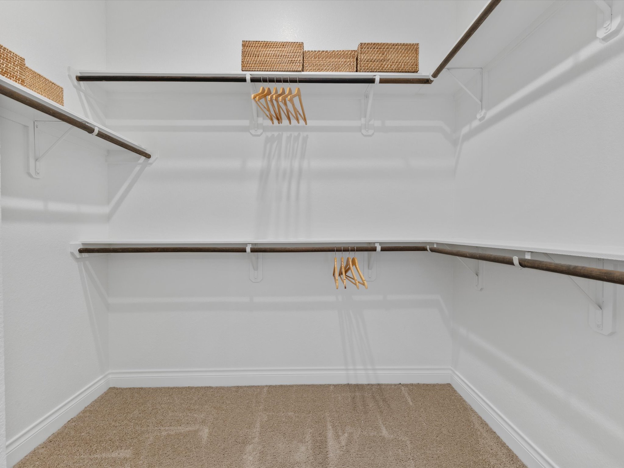 1009 Deer Rim Road Leander, TX 78641 - Photo 17 of 40 The ensuite bath comes with TWO walk-in closets, plus a linen closet and a private toilet.