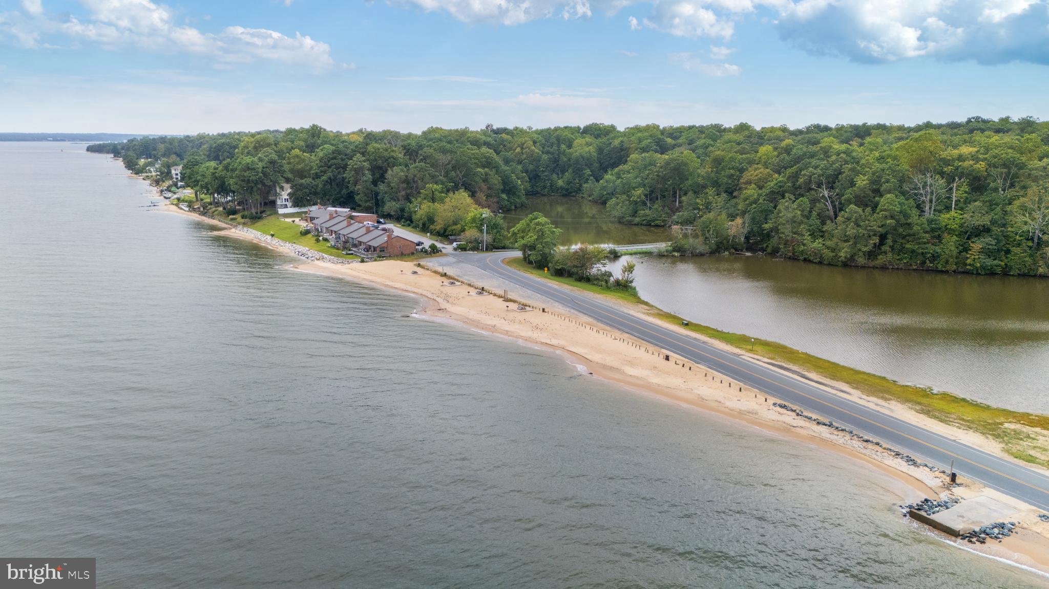 11316 Commanche Road Lusby, MD 20657 - Photo 52 of 68 a view of a lake with a city view