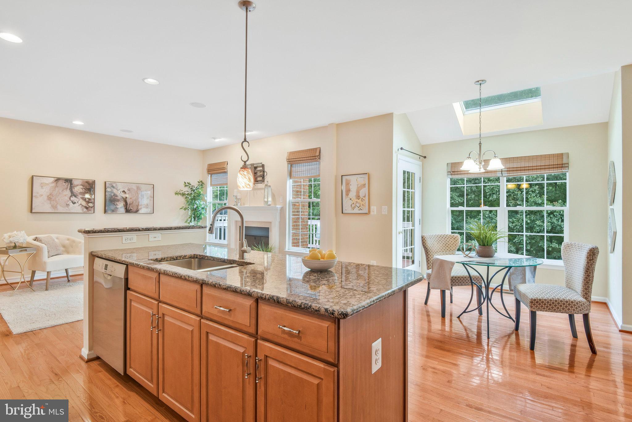 19582 Aspendale Square Ashburn, VA 20147 - Photo 11 of 45 Open concept kitchen and family room