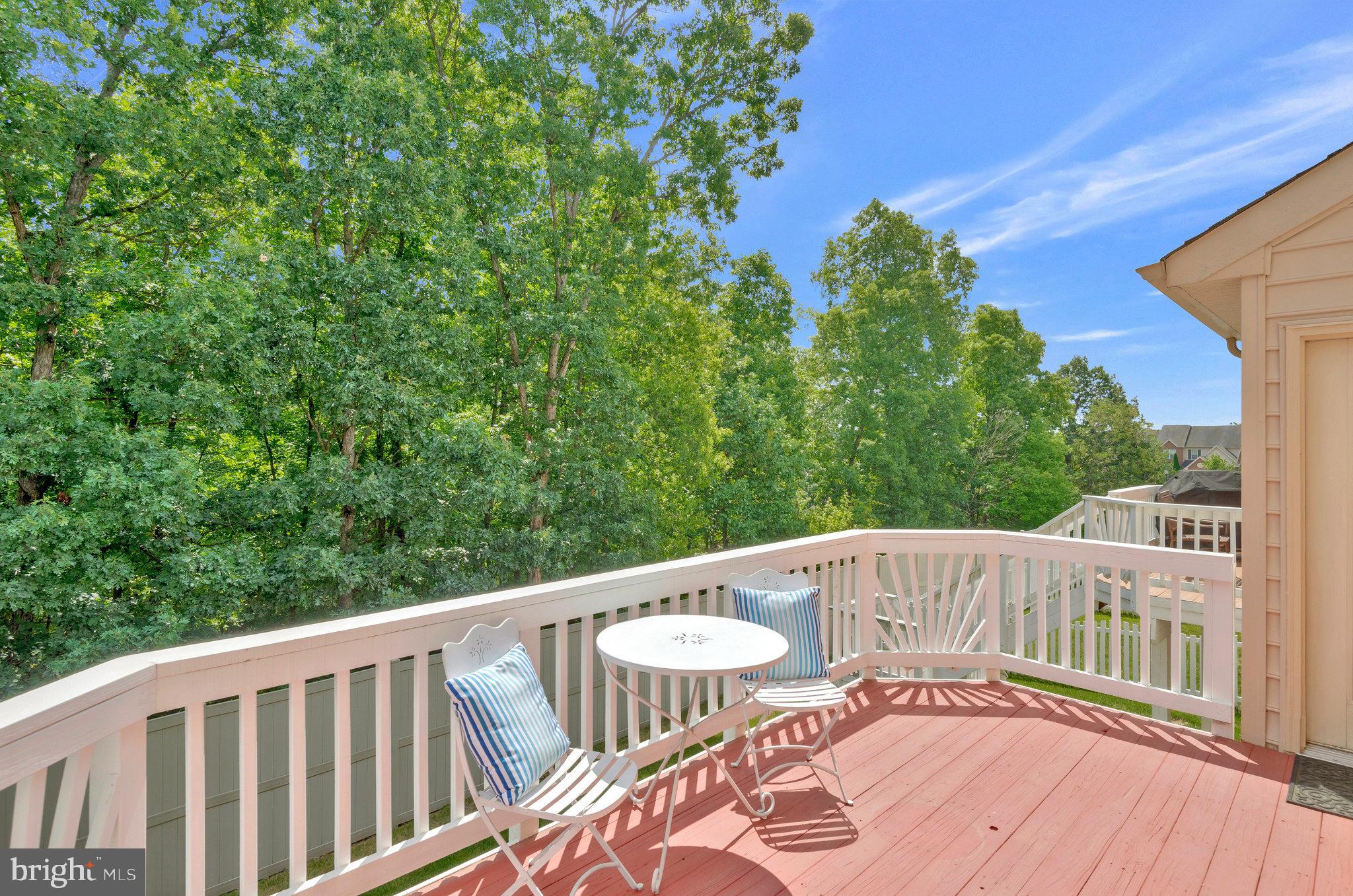 19582 Aspendale Square Ashburn, VA 20147 - Photo 15 of 45 Beautiful deck with wooded views