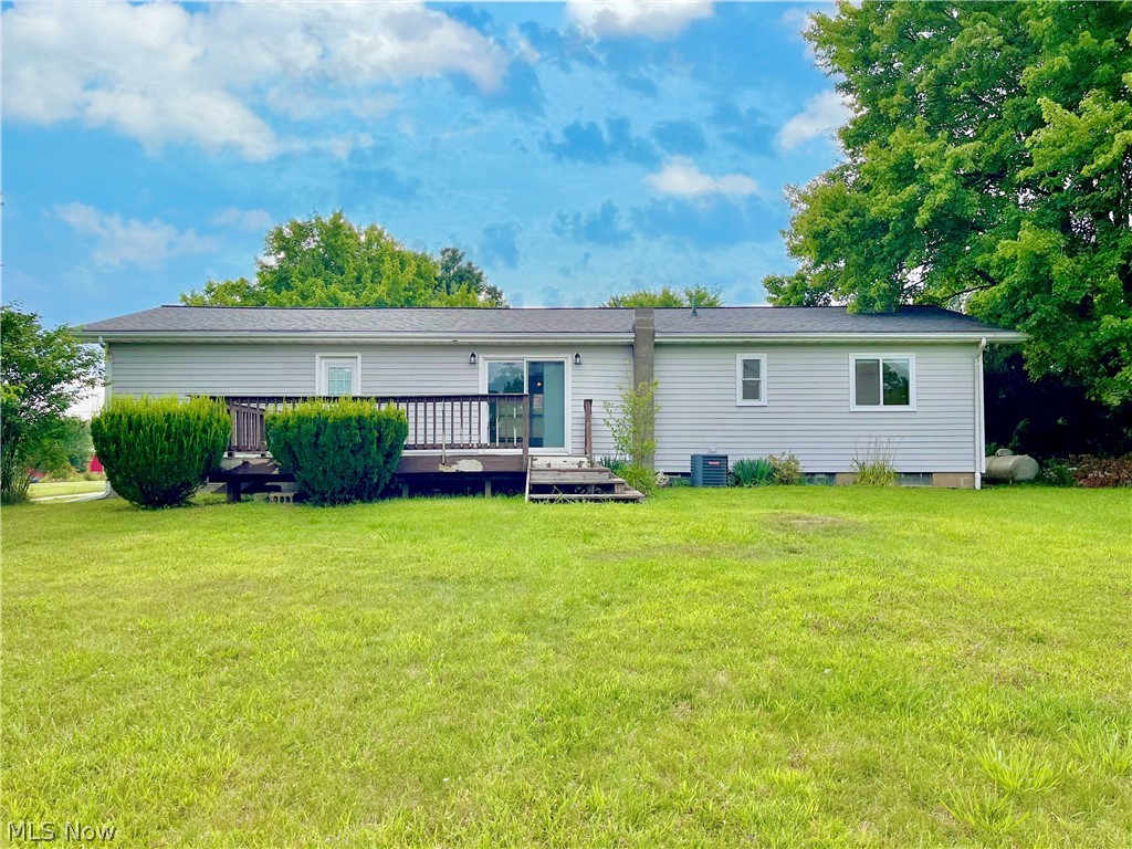 9914 Homestead Road Wadsworth, OH 44281 - Photo 21 of 23 Rear view of home and a deck