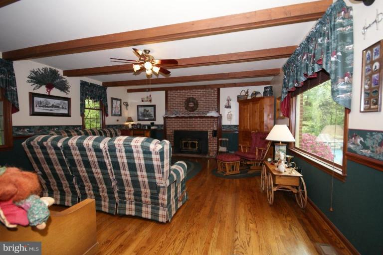 7396 Clifton Road Clifton, VA 20124 - Photo 13 of 30 The rustic family room and fireplace