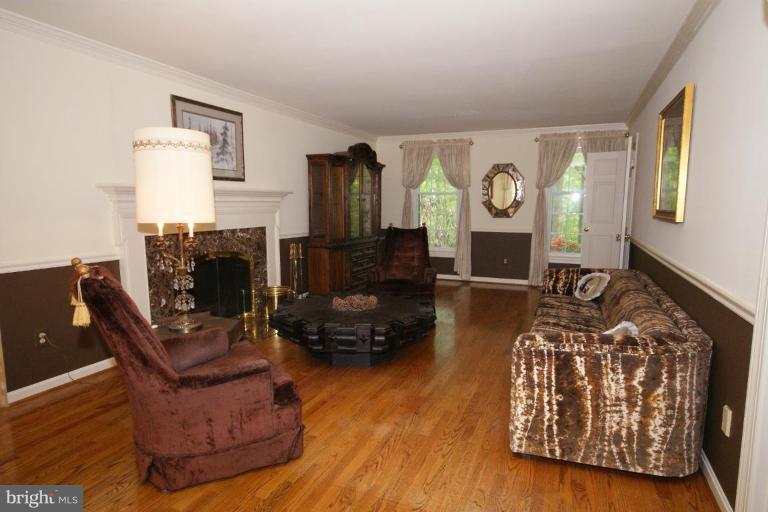 7396 Clifton Road Clifton, VA 20124 - Photo 14 of 30 The living room and fireplace