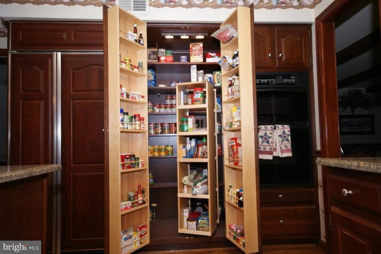 7396 Clifton Road Clifton, VA 20124 - Photo 18 of 30 The pantry and swivel shelves