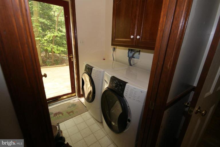 7396 Clifton Road Clifton, VA 20124 - Photo 19 of 30 The laundry room and washer dryer