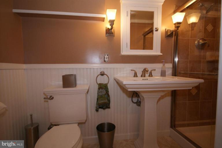 7396 Clifton Road Clifton, VA 20124 - Photo 30 of 30 The modern bath in the finished lower level
