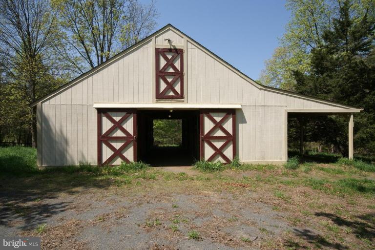 7396 Clifton Road Clifton, VA 20124 - Photo 4 of 30 The 5 stall center aisle barn and hay loft