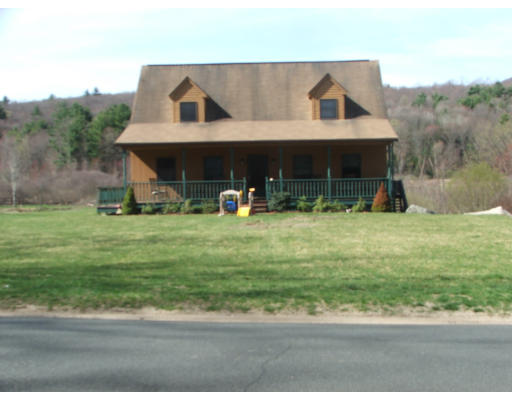 300 Scantic Road Hampden, MA 01036 - Photo 6 of 8 a view of a house with yard and green space