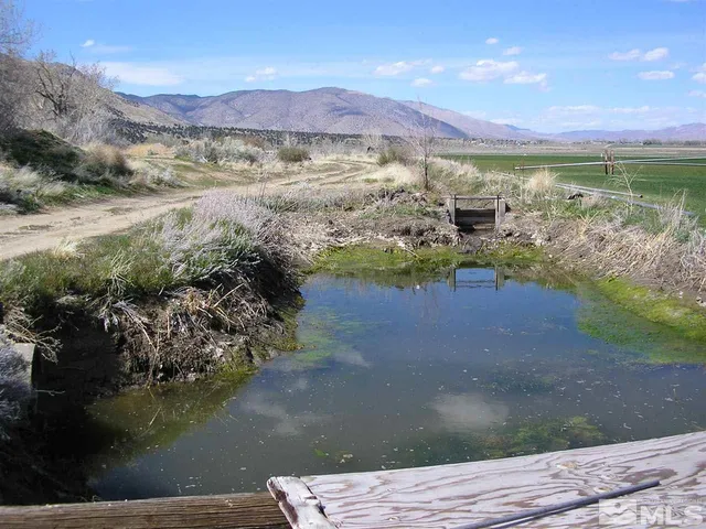 a view of lake with mountain