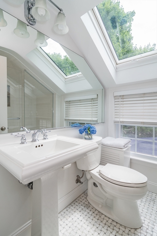 29 Brookfield Road Wellesley, MA 02481 - Photo 15 of 23 a bathroom with a sink a toilet a mirror and bathtub