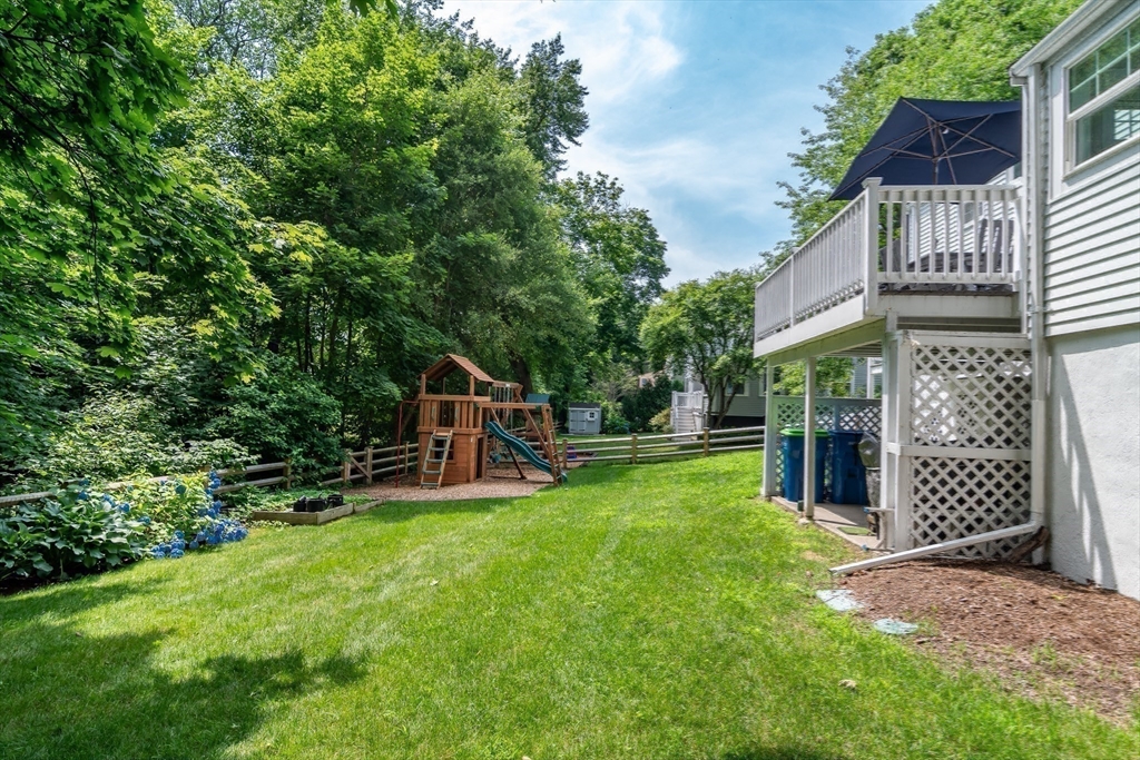 29 Brookfield Road Wellesley, MA 02481 - Photo 21 of 23 a view of a house with a yard and sitting area