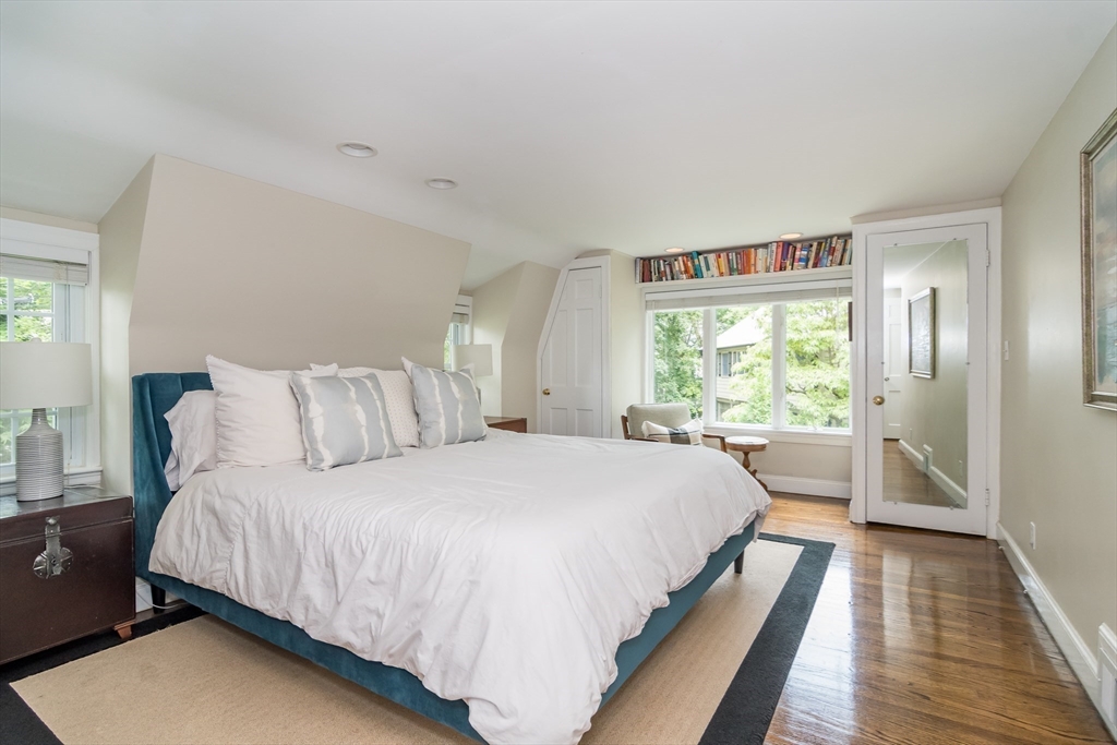 29 Brookfield Road Wellesley, MA 02481 - Photo 10 of 23 a large bed sitting in a bedroom next to a window