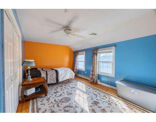 11 Partridge Road Dracut, MA 01826 - Photo 12 of 40 a bedroom with furniture and a couch