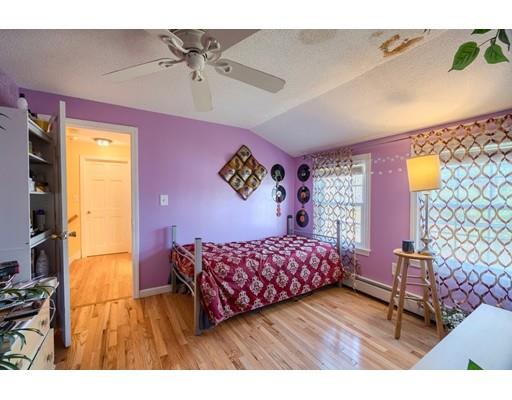 11 Partridge Road Dracut, MA 01826 - Photo 16 of 40 a bedroom with furniture and a window