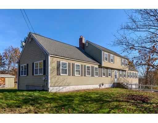 11 Partridge Road Dracut, MA 01826 - Photo 2 of 40 a house view with a garden space