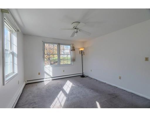11 Partridge Road Dracut, MA 01826 - Photo 28 of 40 a view of an empty room with a window