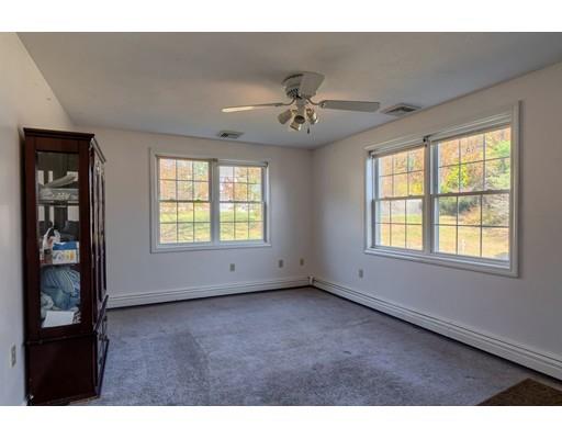 11 Partridge Road Dracut, MA 01826 - Photo 31 of 40 a view of an empty room with a window