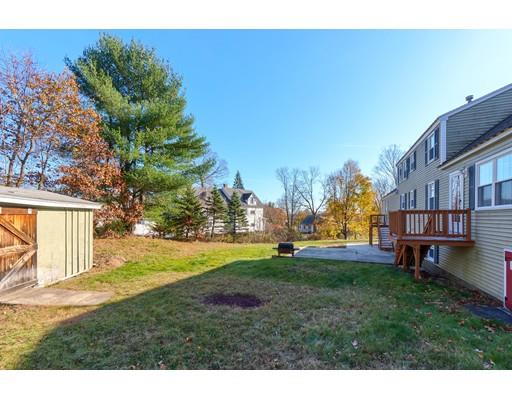 11 Partridge Road Dracut, MA 01826 - Photo 40 of 40 a view of a backyard with a garden and plants