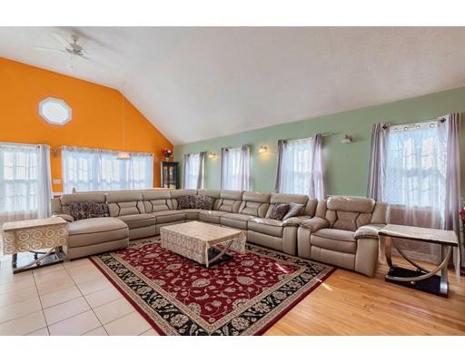 11 Partridge Road Dracut, MA 01826 - Photo 7 of 40 a living room with furniture and a large window