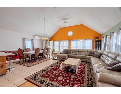 11 Partridge Road Dracut, MA 01826 - Photo 8 of 40 a living room with furniture and a large window
