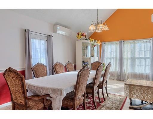 11 Partridge Road Dracut, MA 01826 - Photo 9 of 40 a view of a dining room with furniture and wooden floor