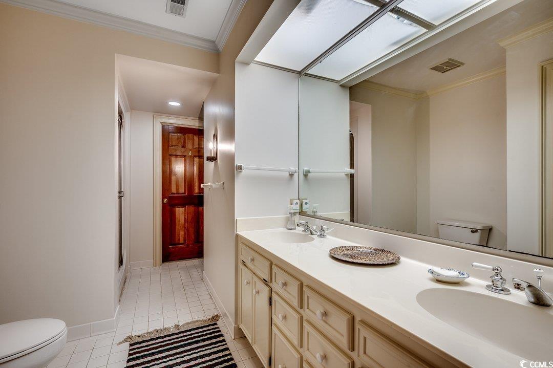 12 Chapin Circle Myrtle Beach, SC 29572 - Photo 25 of 39 Full bath featuring visible vents, ornamental molding, toilet, and a sink